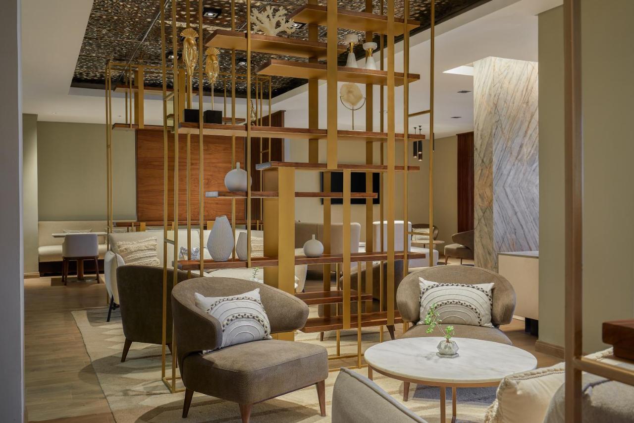 Hyatt Regency Cairo West Hotel 6th of October City Buitenkant foto The Lounge at the airport